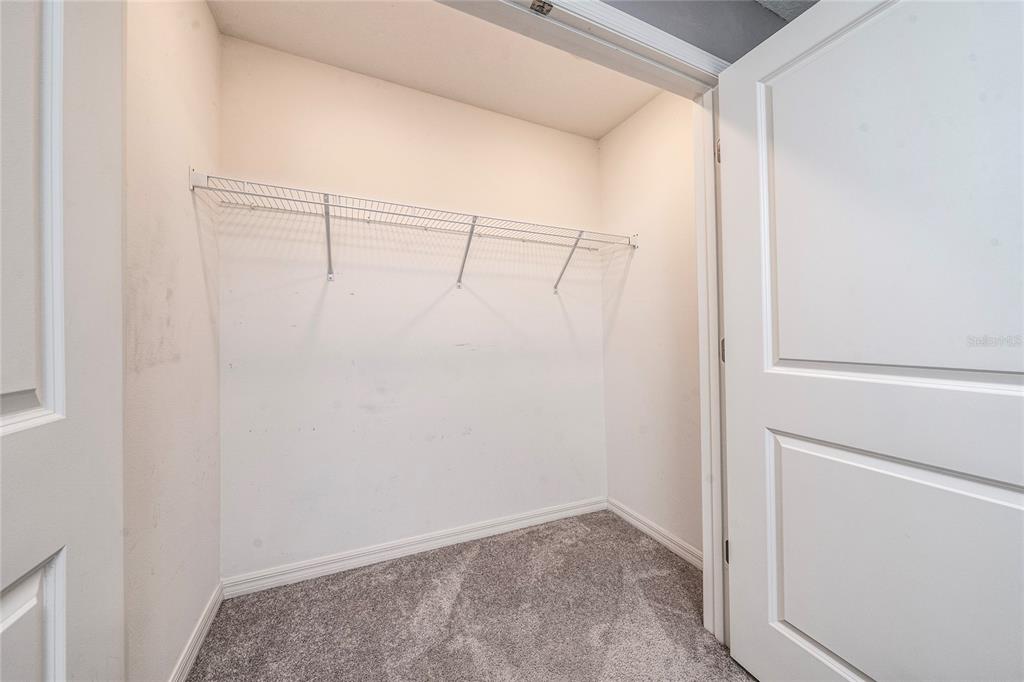 2060 Viewfinder Street Kissimmee, FL 34758 - Photo 18 of 23 a view of small space with racks on the wall