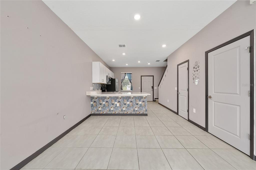 2060 Viewfinder Street Kissimmee, FL 34758 - Photo 6 of 23 a view of entryway with stairs