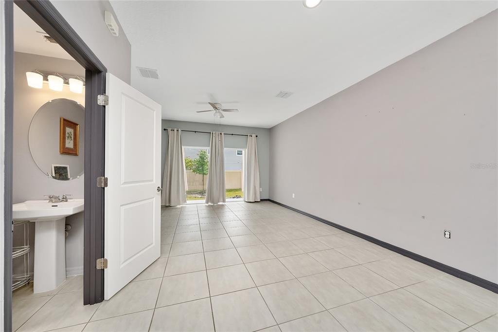2060 Viewfinder Street Kissimmee, FL 34758 - Photo 7 of 23 a view of a hallway with closet and entryway