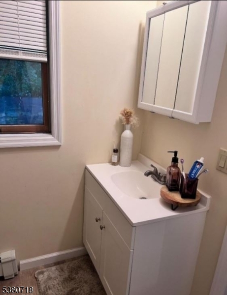 12 Ravine Road Wantage, NJ 07461 - Photo 14 of 19 a bathroom with a sink and a toilet