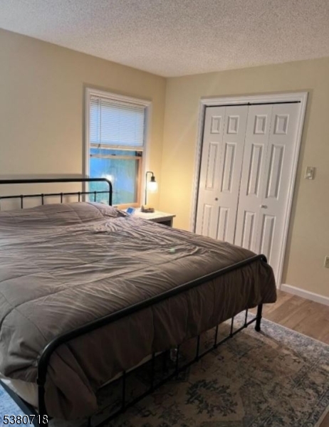 12 Ravine Road Wantage, NJ 07461 - Photo 17 of 19 a bedroom with a bed and a window