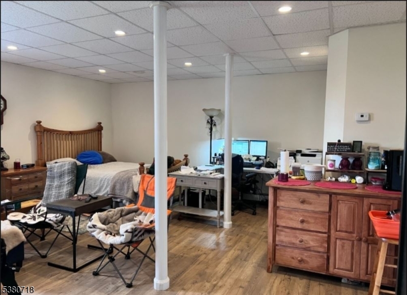 12 Ravine Road Wantage, NJ 07461 - Photo 18 of 19 a living room with furniture and a wooden floor