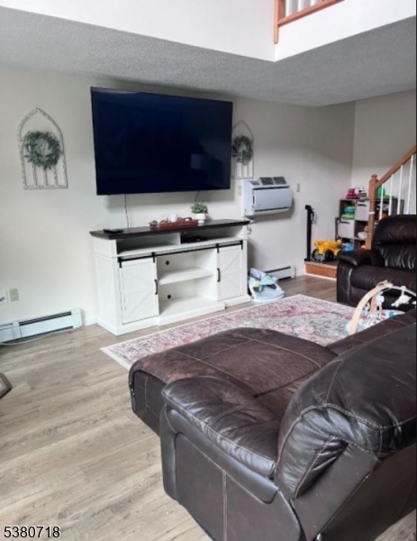 12 Ravine Road Wantage, NJ 07461 - Photo 5 of 19 a living room with stainless steel appliances granite countertop a stove and a sink