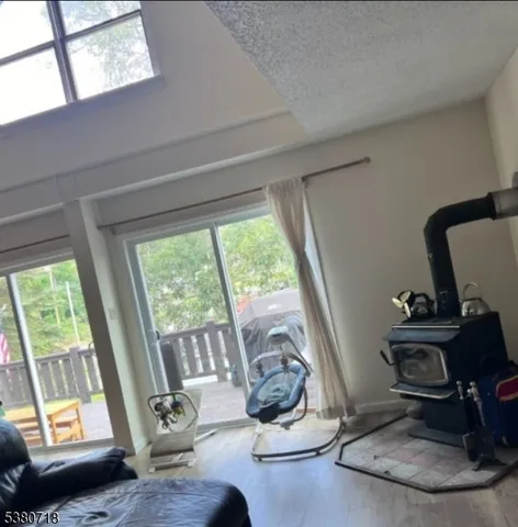 a room with gym equipment and a large window