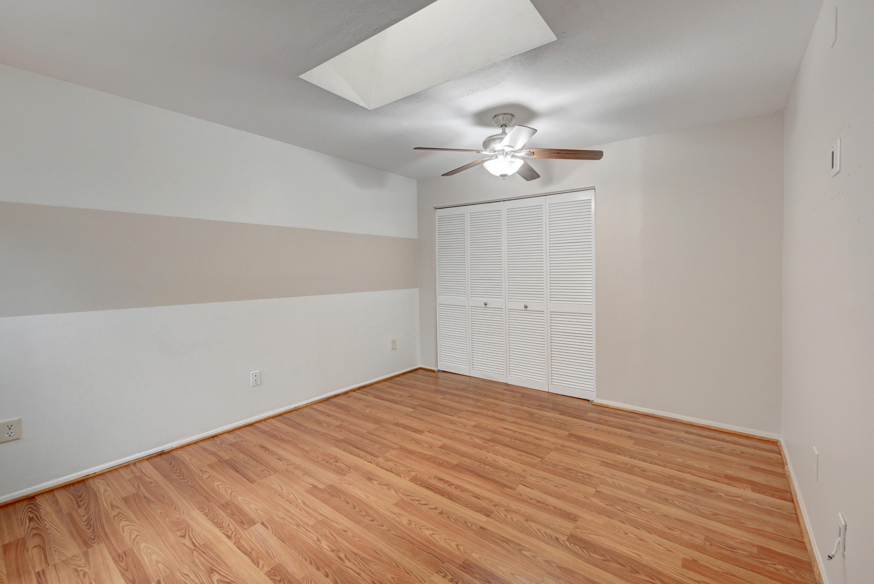 23328 Southwest 58th Avenue, Unit C Boca Raton, FL 33428 - Photo 19 of 35 a view of empty room with wooden floor
