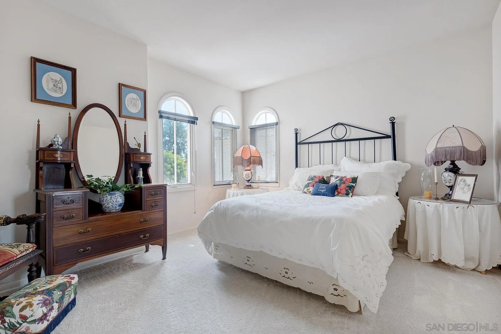 5448 Renaissance Avenue San Diego, CA 92122 - Photo 25 of 35 a bedroom with bed and a dresser