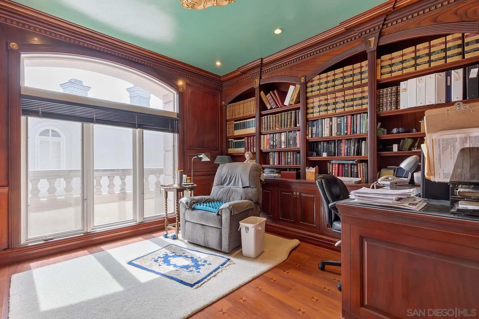 5448 Renaissance Avenue San Diego, CA 92122 - Photo 27 of 35 a work room with furniture and a floor to ceiling window