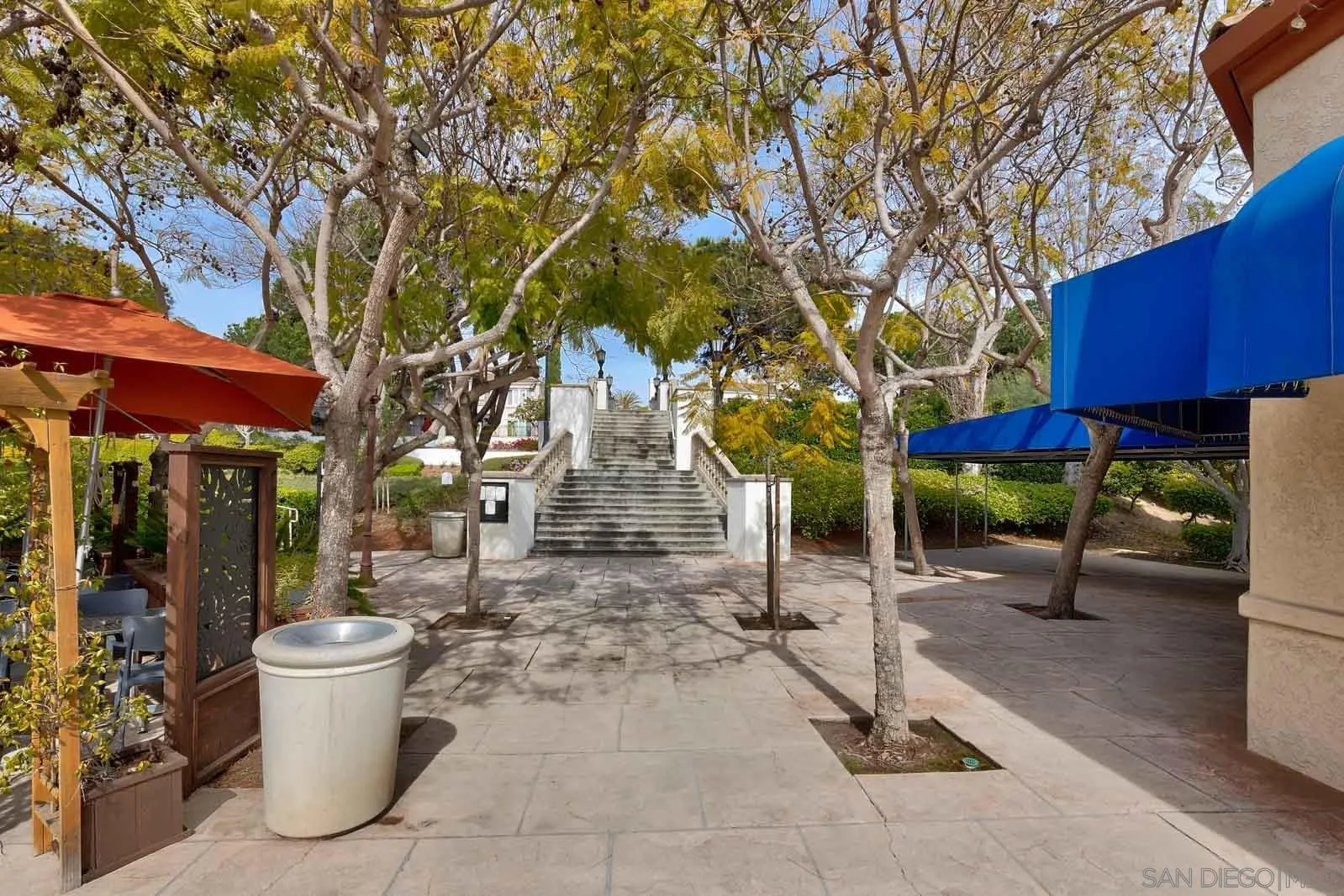 5448 Renaissance Avenue San Diego, CA 92122 - Photo 35 of 35 a view of a patio with chairs and potted plants