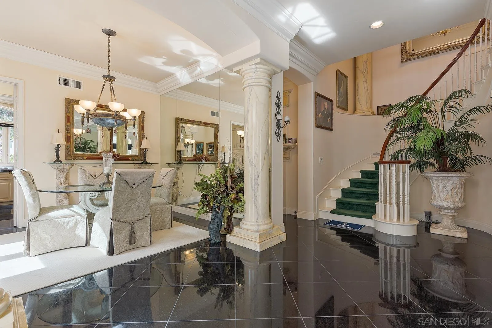 5448 Renaissance Avenue San Diego, CA 92122 - Photo 10 of 35 a lobby with table and chairs