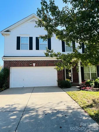a front view of house with yard