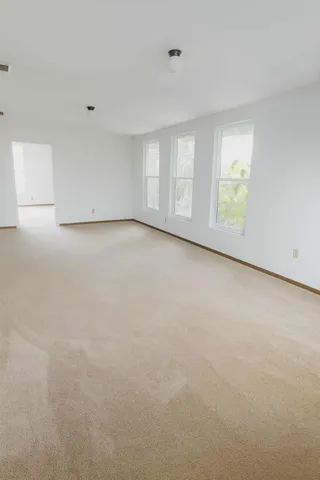an empty room with windows