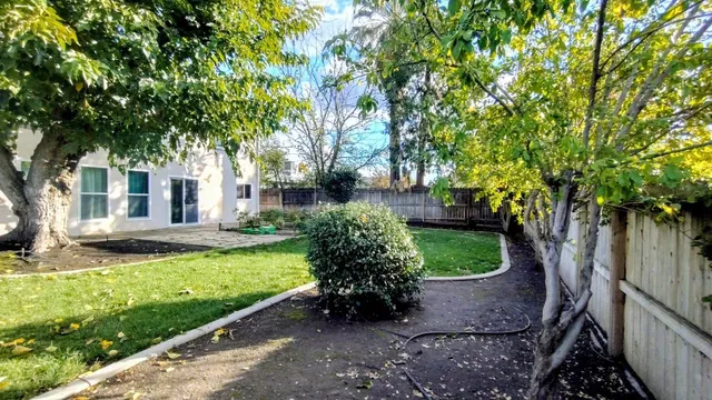 a swimming pool with a yard