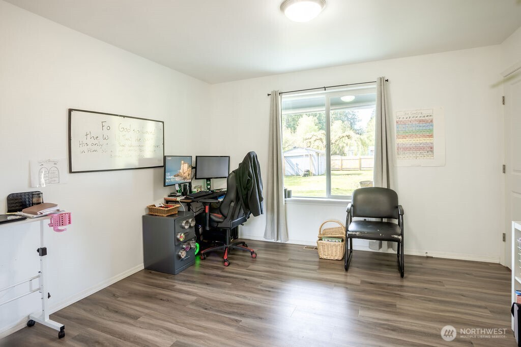 105 Johnson Road South Winlock, WA 98596 - Photo 22 of 32 a view of a livingroom with workspace and a window