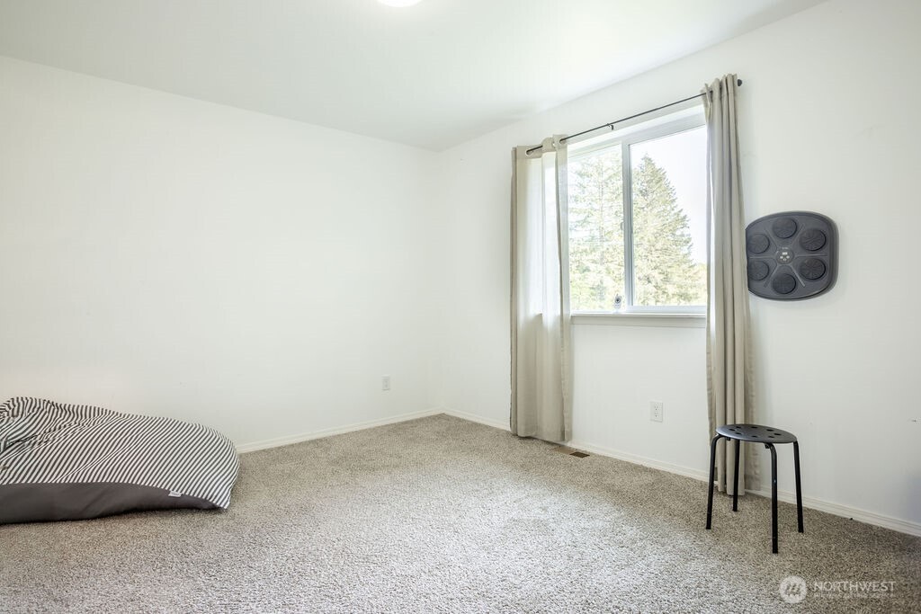 105 Johnson Road South Winlock, WA 98596 - Photo 25 of 32 a view of room with window and furniture