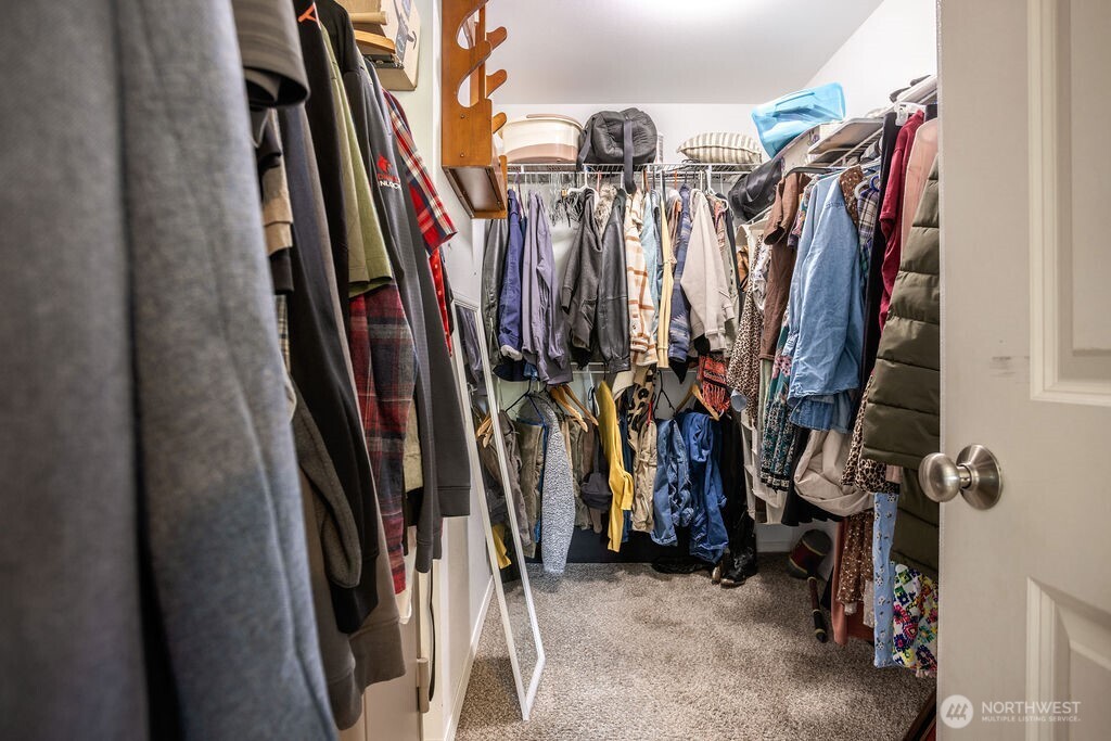 105 Johnson Road South Winlock, WA 98596 - Photo 27 of 32 a view of walk in closet with clothes