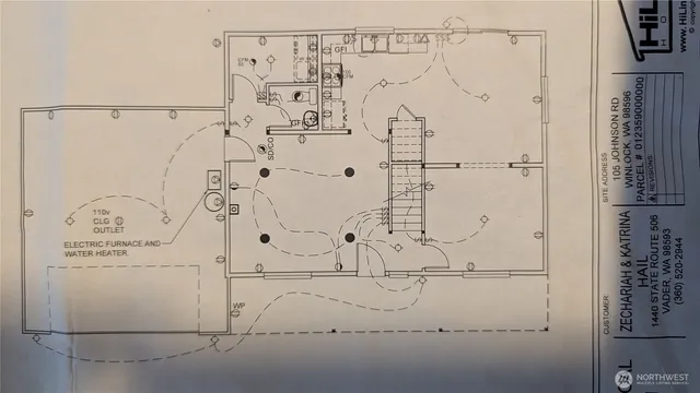 an aerial view of a residential houses with yard