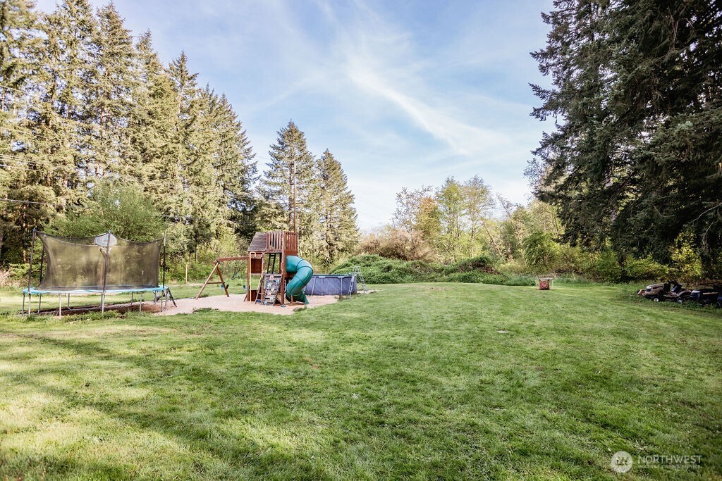 105 Johnson Road South Winlock, WA 98596 - Photo 5 of 32 a view of a yard in front of the house