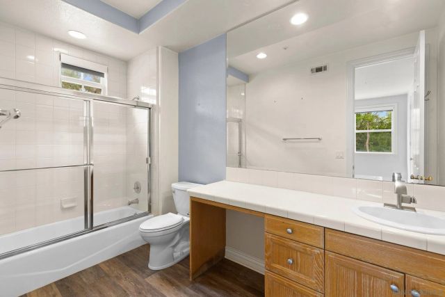 a view of a tables and chairs in a patio