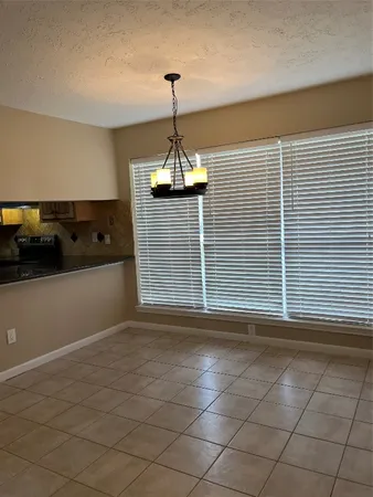 a view of a livingroom with a chandelier