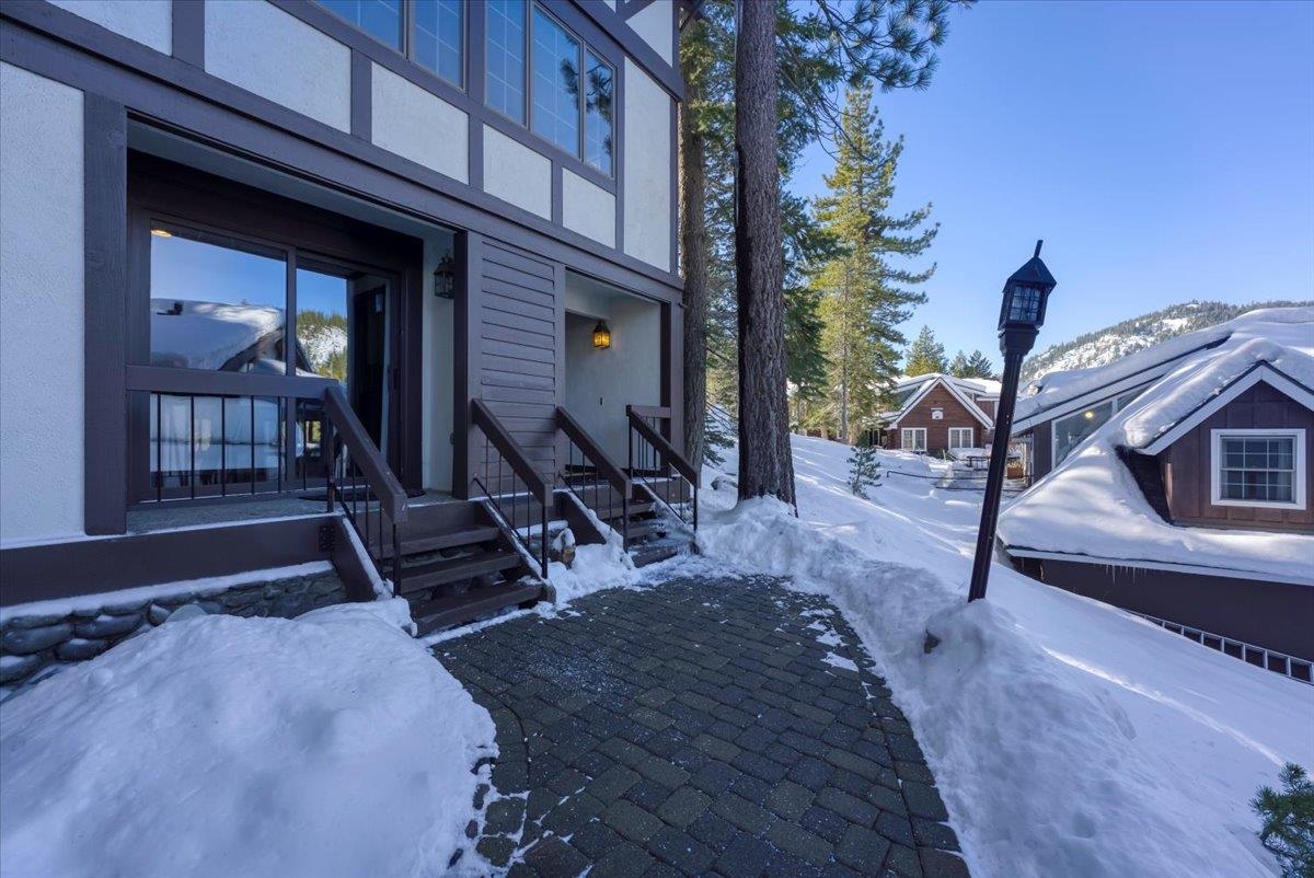 227 Olympic Vly Road, Unit 15 Olympic Valley, CA 96146 - Photo 2 of 28 a view of a house with backyard porch and sitting area