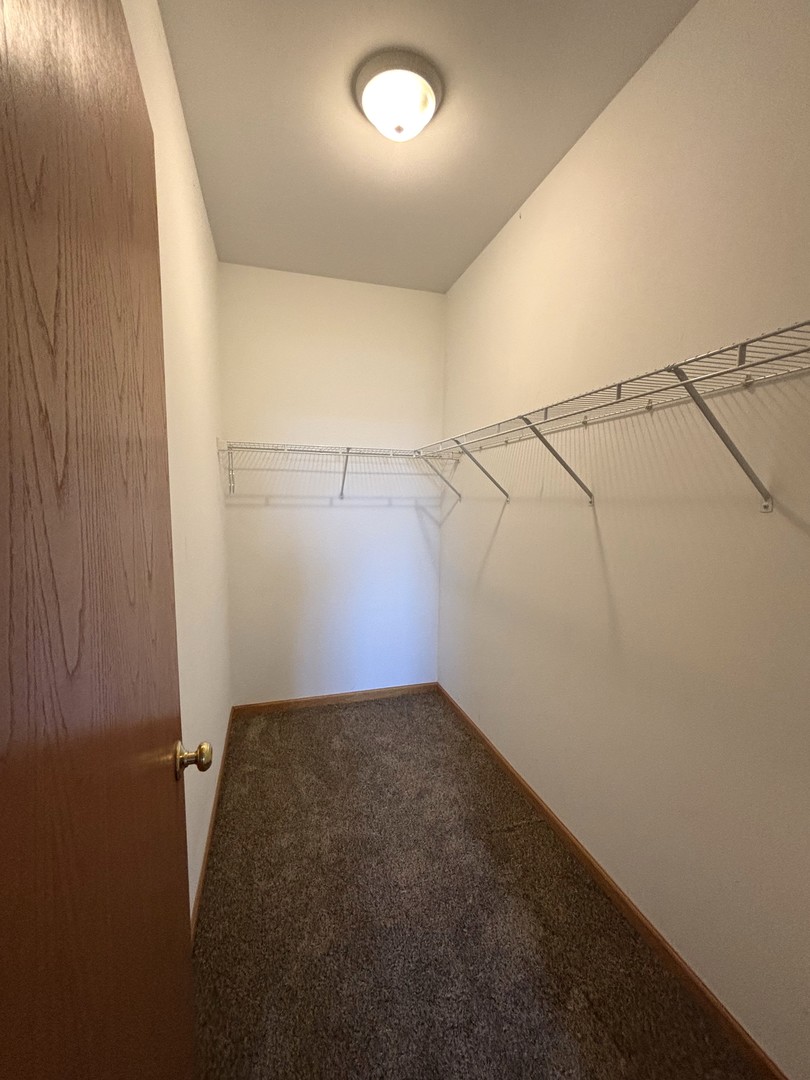 1923 Taller Road, Unit 1923 Morris, IL 60450 - Photo 8 of 12 a view of a room with racks on the wall