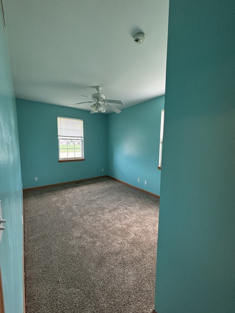 1923 Taller Road, Unit 1923 Morris, IL 60450 - Photo 10 of 12 a view of an empty room with a window