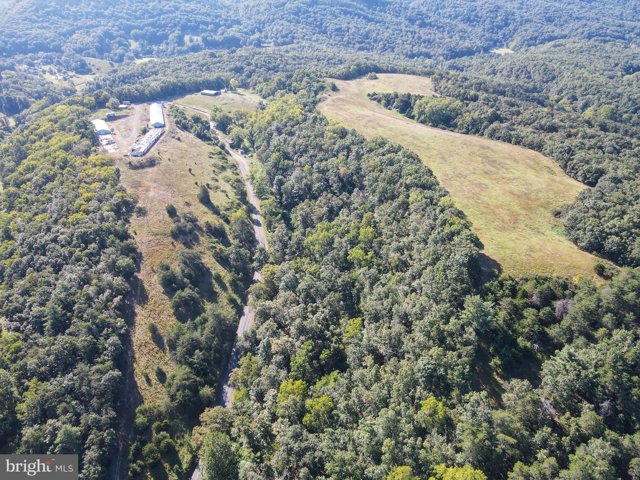 1030 Kites Road Petersburg, WV 26847 - Photo 51 of 51 Lush hillsides embrace serene landscapes.
