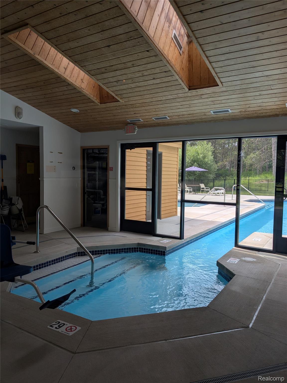4749 South Pleasantview Road, Unit 37 Harbor Springs, MI 49740 - Photo 32 of 44 Indoor/Outdoor Pool in Main Office