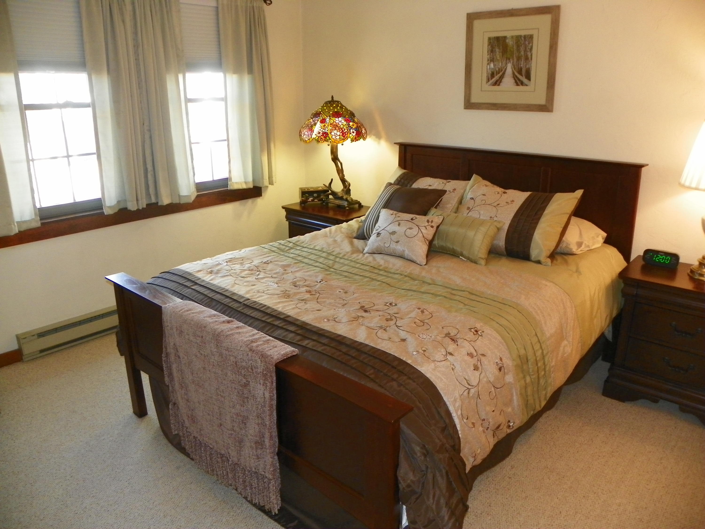 300 Falmouth Road, Unit 6E Mashpee, MA 02649 - Photo 15 of 32 a bedroom with bed and window