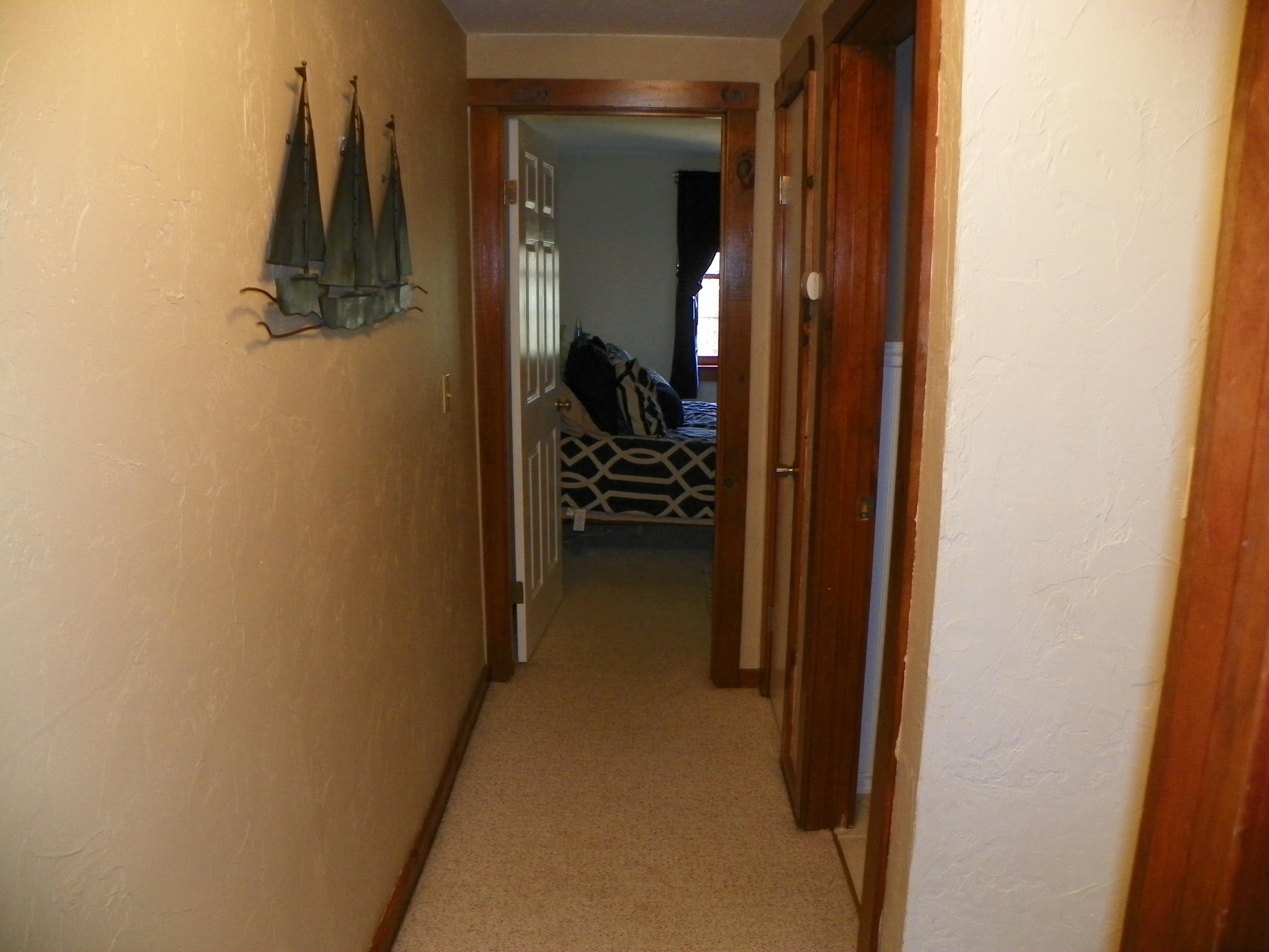 300 Falmouth Road, Unit 6E Mashpee, MA 02649 - Photo 16 of 32 a view of hallway with walk in closet and bathroom