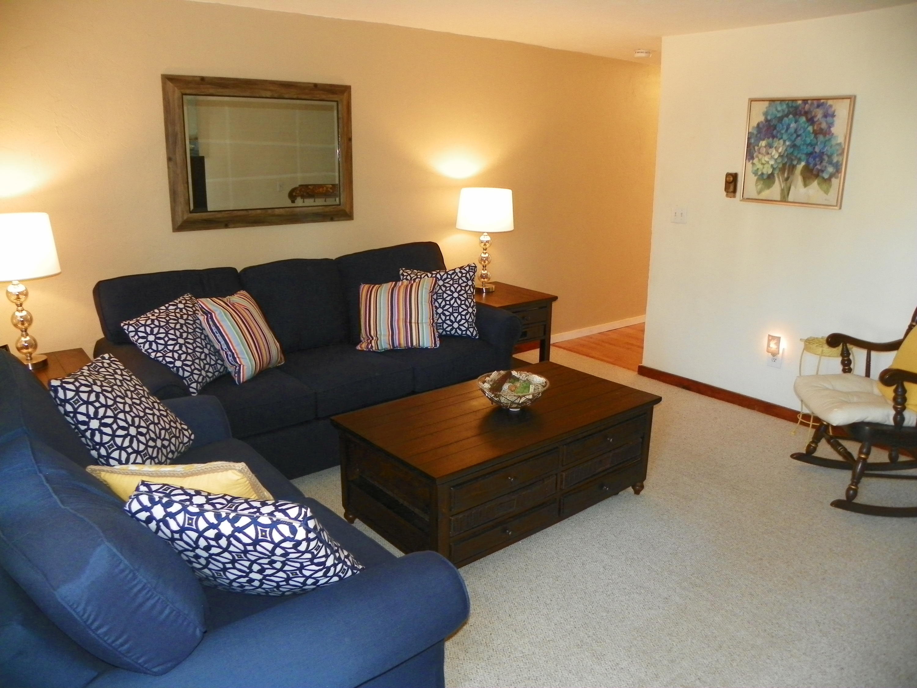 300 Falmouth Road, Unit 6E Mashpee, MA 02649 - Photo 2 of 32 a living room with furniture