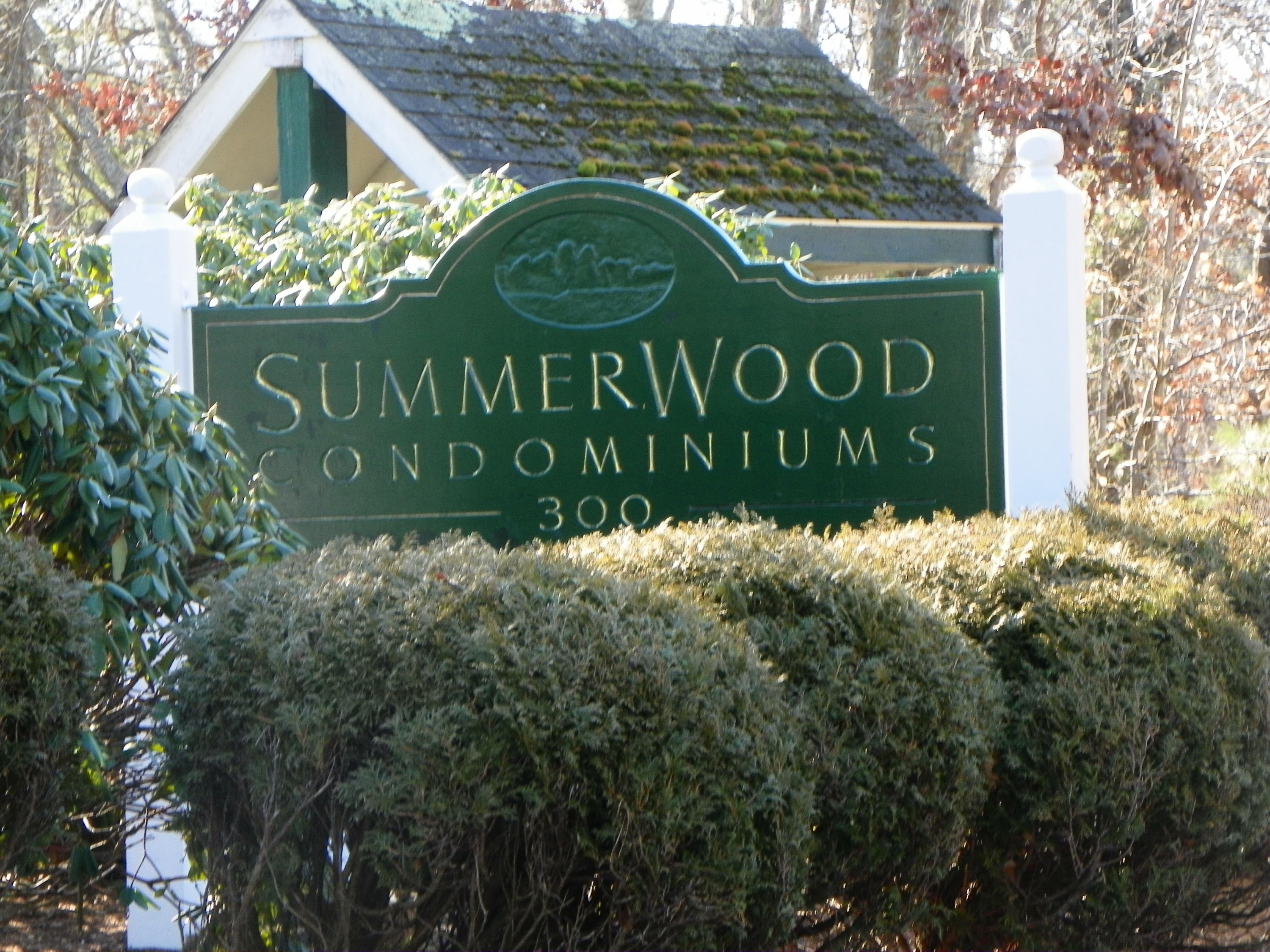 300 Falmouth Road, Unit 6E Mashpee, MA 02649 - Photo 32 of 32 a sign that is on the side of the building