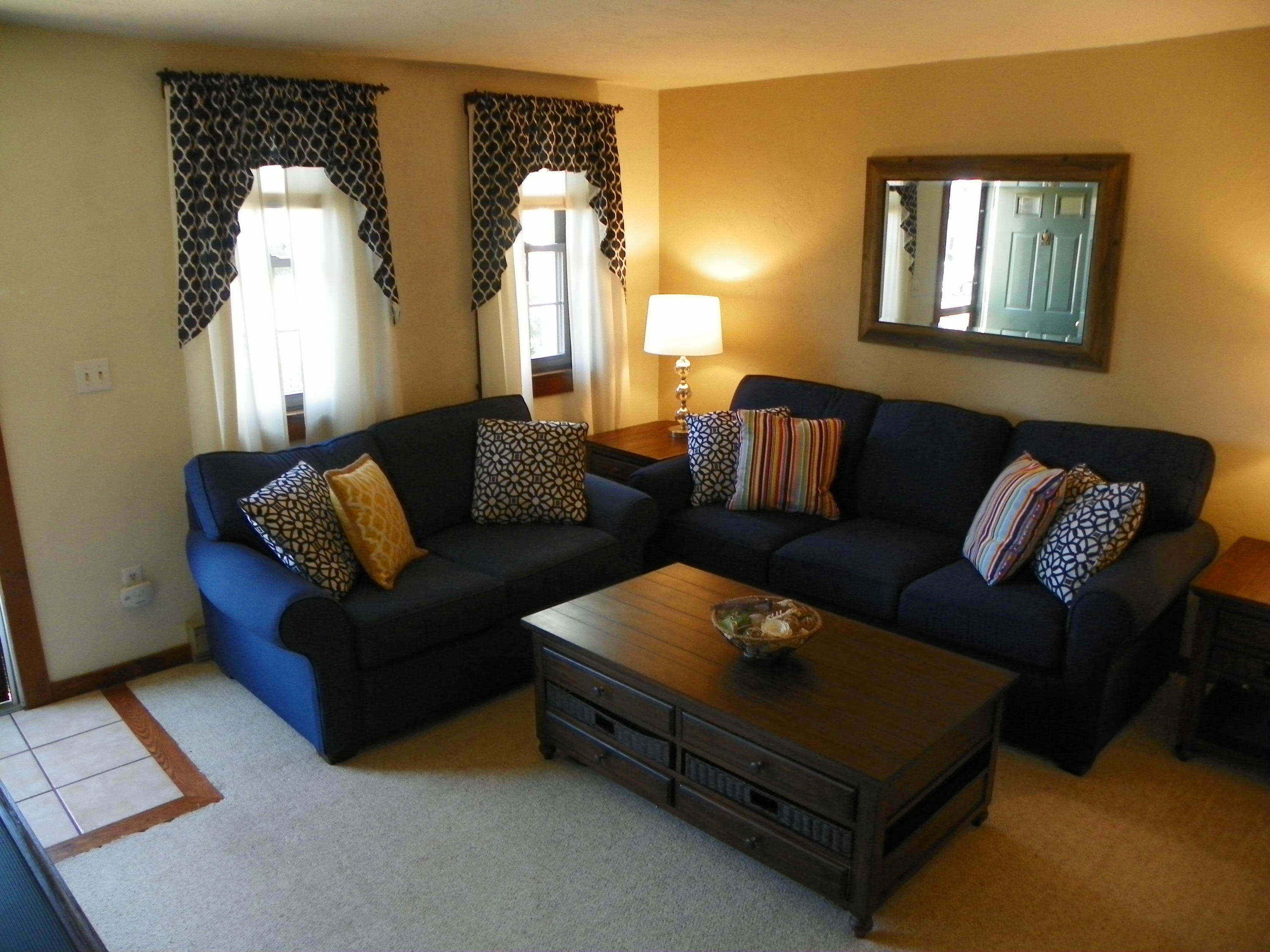 300 Falmouth Road, Unit 6E Mashpee, MA 02649 - Photo 5 of 32 a living room with furniture and a window