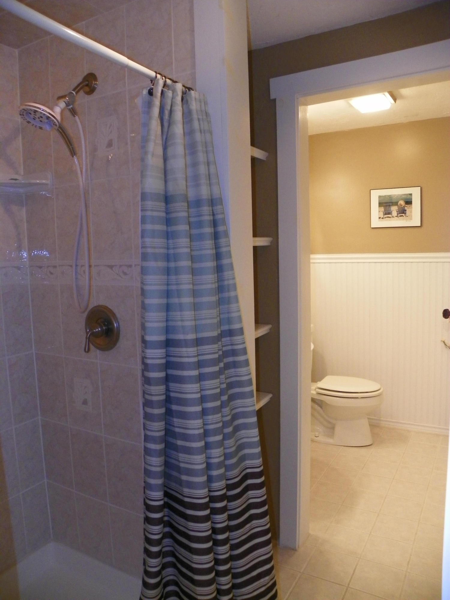 300 Falmouth Road, Unit 6E Mashpee, MA 02649 - Photo 6 of 32 a bathroom with a shower and a toilet