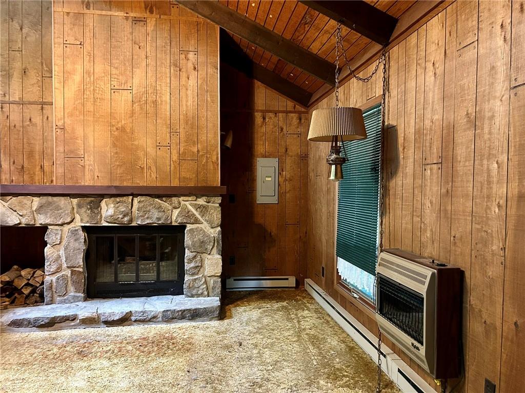 221 North Locust Road Acme, PA 15610 - Photo 6 of 26 a living room with a fireplace