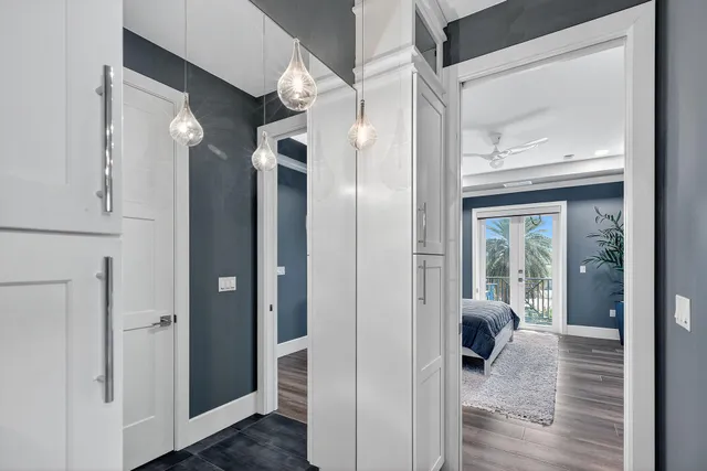 a bathroom with a shower curtain and a window