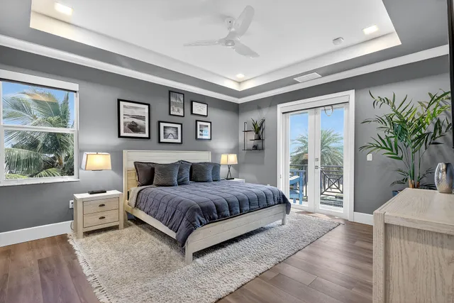 a bathroom with a granite countertop sink mirror toilet and bathtub