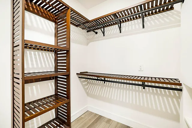 a view of a hardwood & staircase