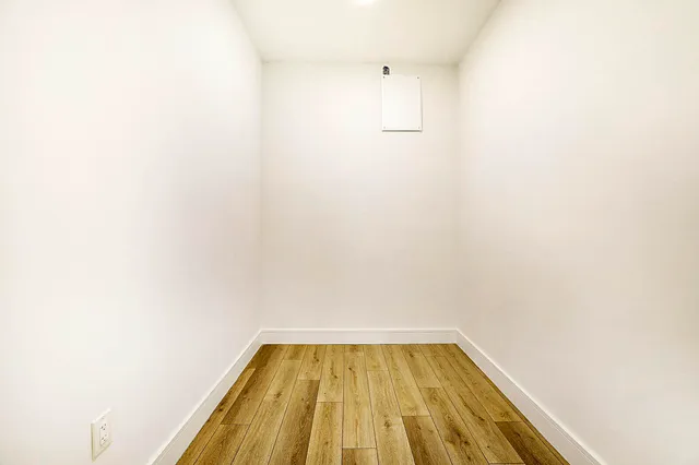 a view of wooden floor in a bathroom
