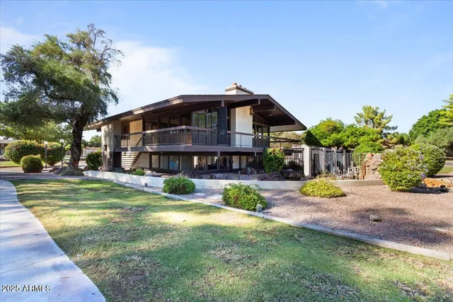 a view of a house with swimming pool