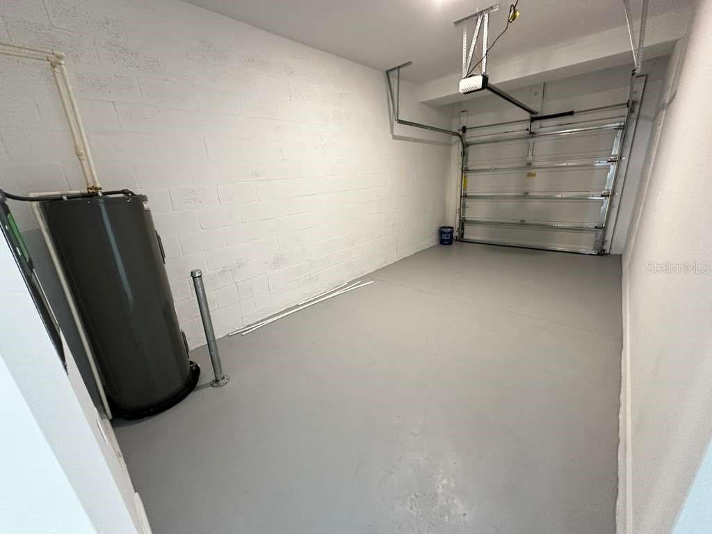 2729 Skyline Loop Kissimmee, FL 34758 - Photo 20 of 20 a view of storage and utility room with stairs
