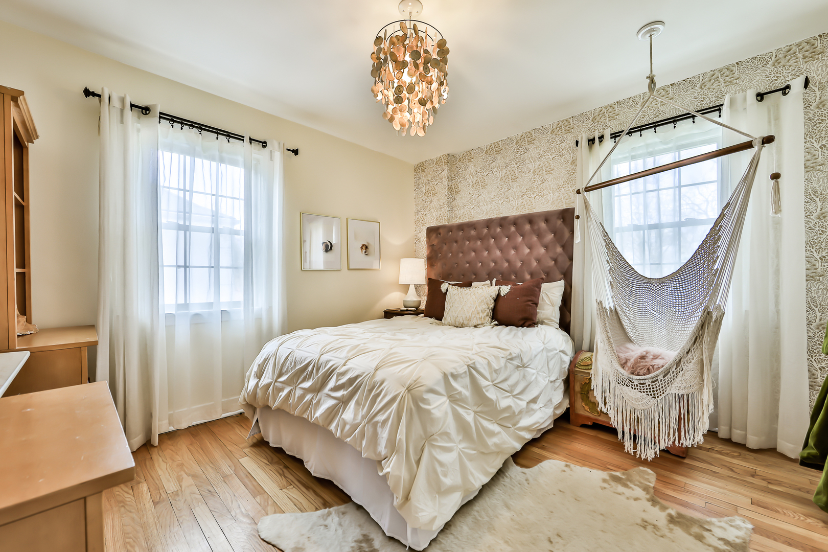 438 Longcommon Road Riverside, IL 60546 - Photo 11 of 16 a bedroom with a bed a mirror and a window
