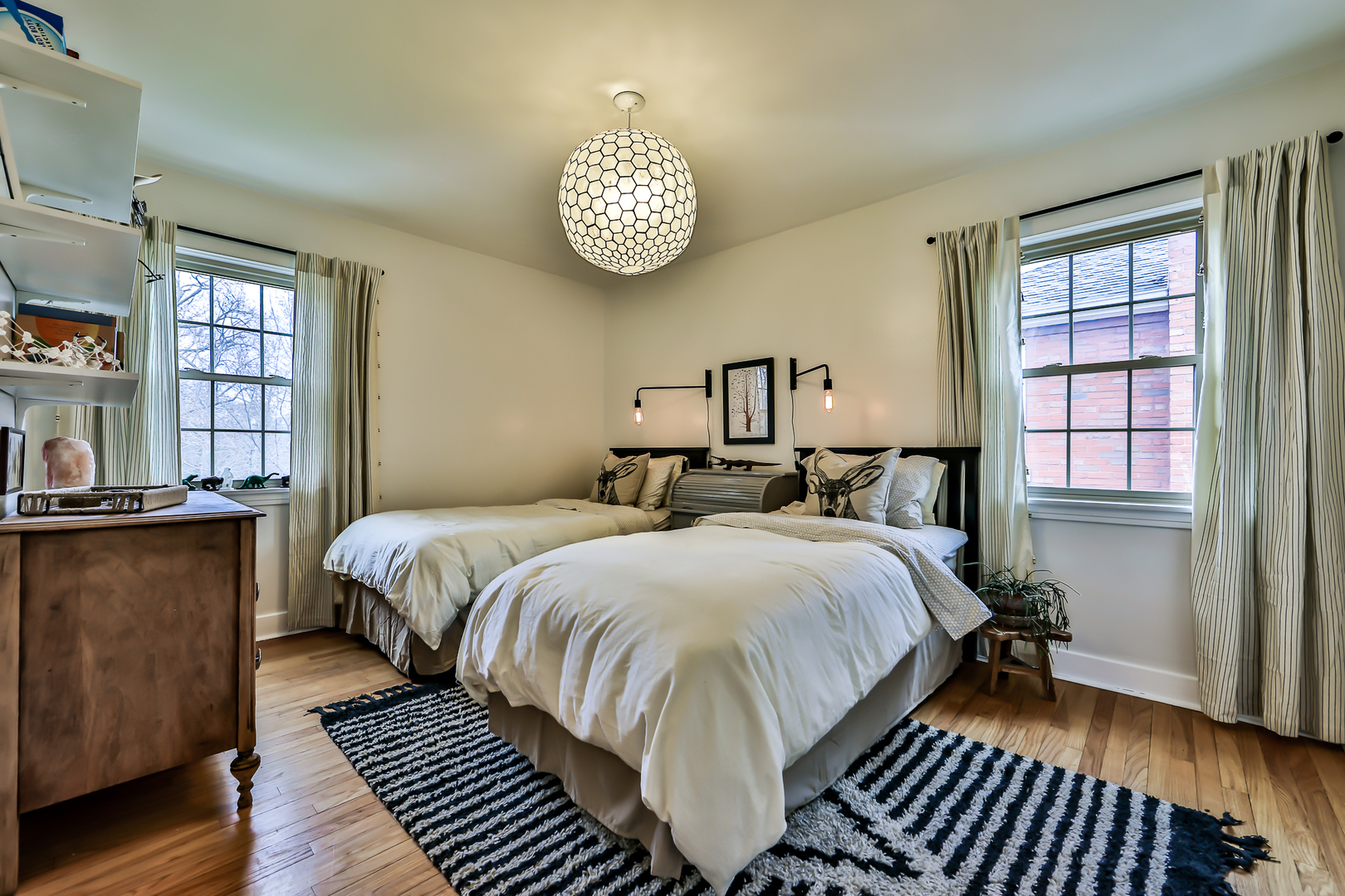 438 Longcommon Road Riverside, IL 60546 - Photo 13 of 16 a bed room with a bed and a window