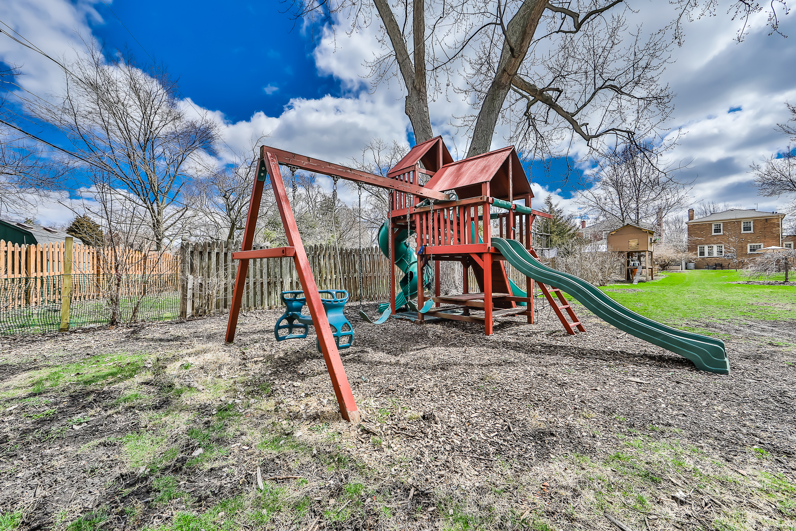 438 Longcommon Road Riverside, IL 60546 - Photo 16 of 16 a view of a park with a slide