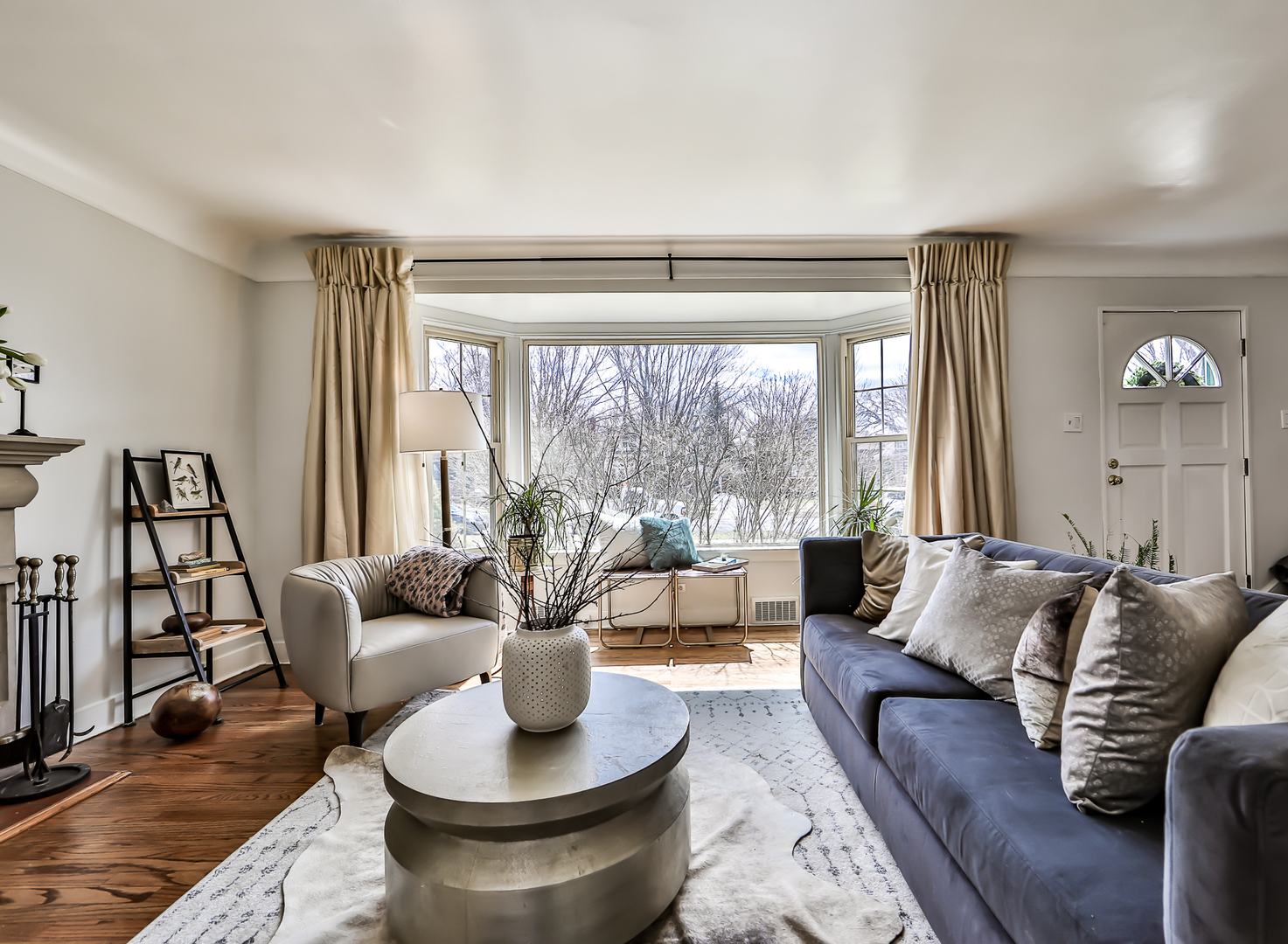 438 Longcommon Road Riverside, IL 60546 - Photo 3 of 16 a living room with furniture and a large window