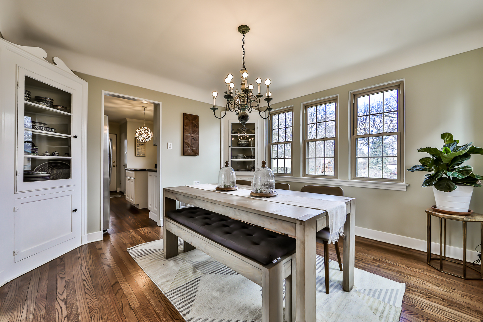 438 Longcommon Road Riverside, IL 60546 - Photo 5 of 16 a view of a dining room with furniture window and wooden floor