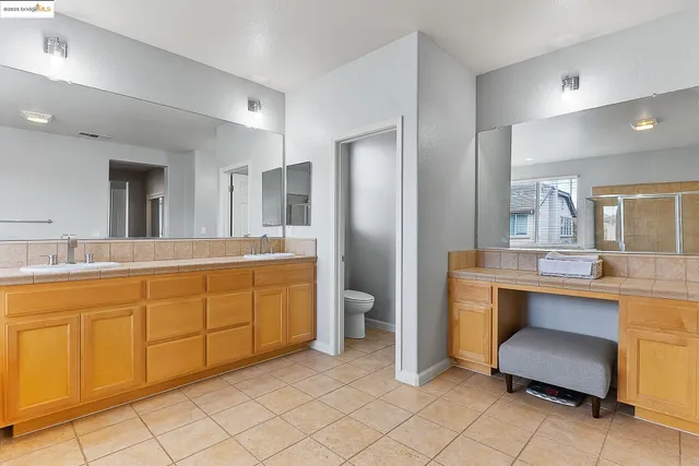 a view of a bedroom from a hallway