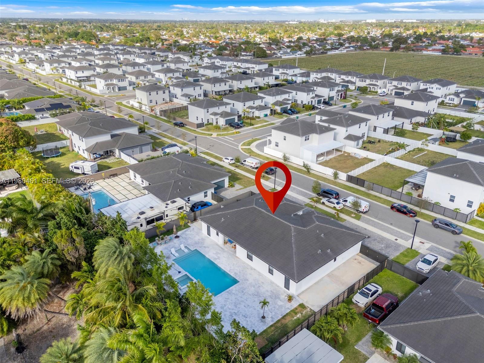 21380 Southwest 127th Place Miami, FL 33177 - Photo 42 of 47 an aerial view of a city with lots of residential buildings