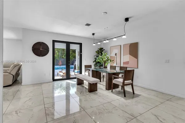 a view of a livingroom with furniture and window