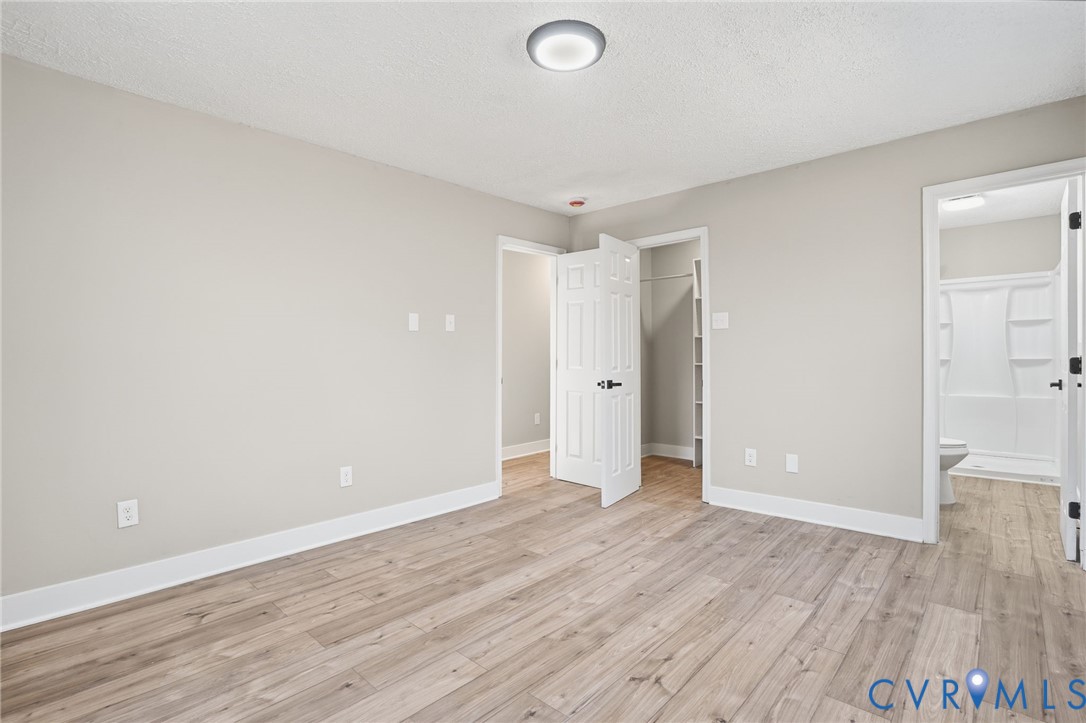 286 Mill Pond Road South St. Stephens Church, VA 23148 - Photo 20 of 39 wooden floor in an empty room